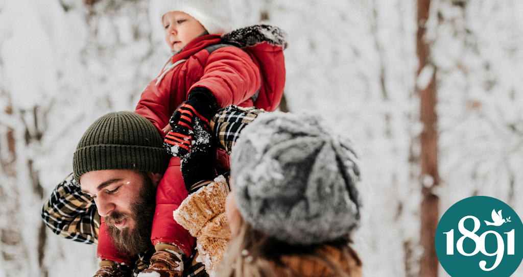 family in snow